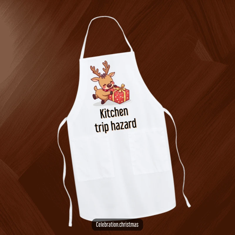 Funny reindeer apron featuring a comical character tripping over a wrapped present, a humorous and practical kitchen accessory.