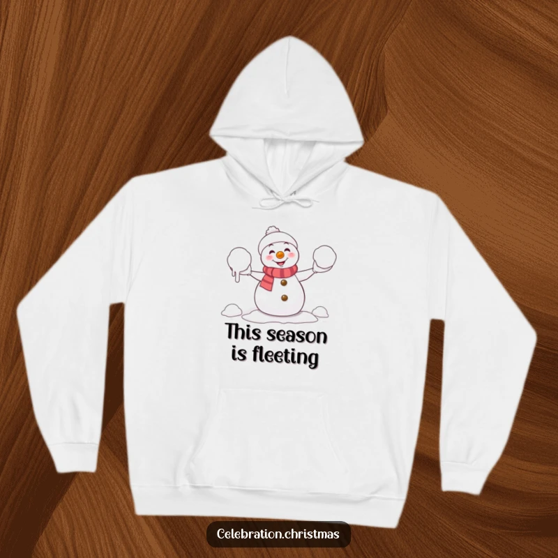 Funny Hoodie: Mischievous snowman in a comical struggle juggling melting snowballs, offering warmth and humor for chilly days.