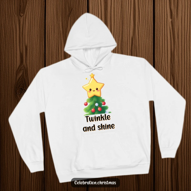 Funny kawaii star topper hoodie, a cute twinkling star character adorning the top of a vibrant, festive Christmas tree.